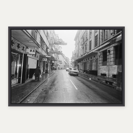 中環雨後街景 1969 舊香港照片掛畫｜黑框合成示意 — Old Hong Kong photo, Central after the rain, 1969, black frame mockup