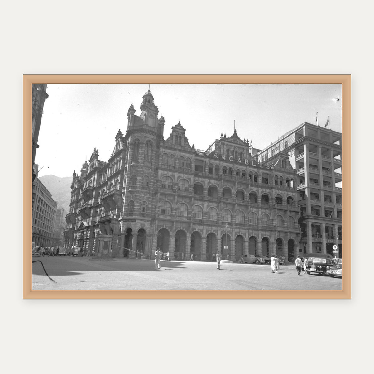中環海旁拱廊大樓 1952 舊香港照片掛畫｜原木框合成示意 — Old Hong Kong photo, Waterfront arcade building, Central, 1952, natural wood frame mockup