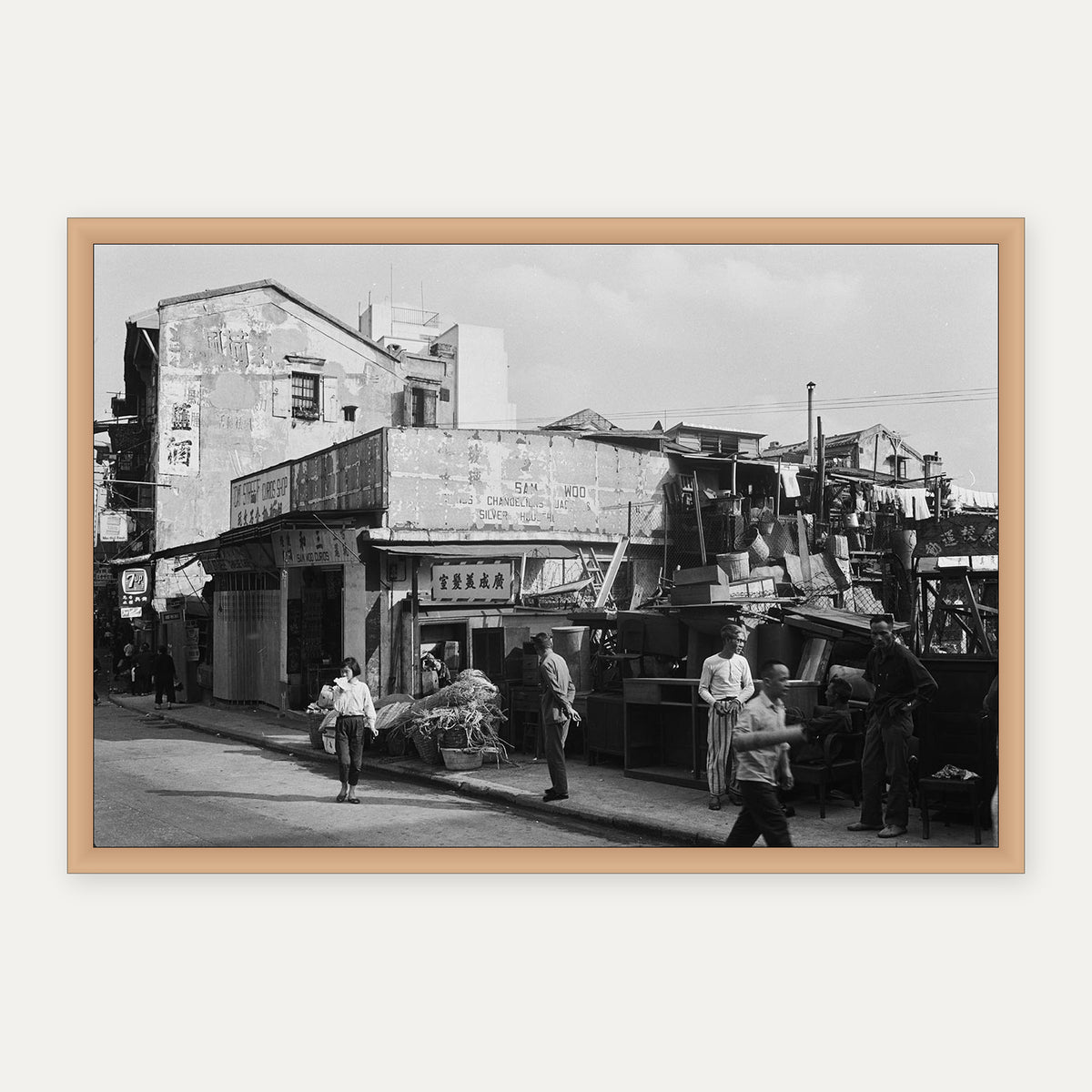 中環街坊與雜貨鋪 1968 舊香港照片掛畫｜原木框合成示意 — Old Hong Kong photo, Neighbourhood grocery shops, Central, 1968, natural wood frame mockup